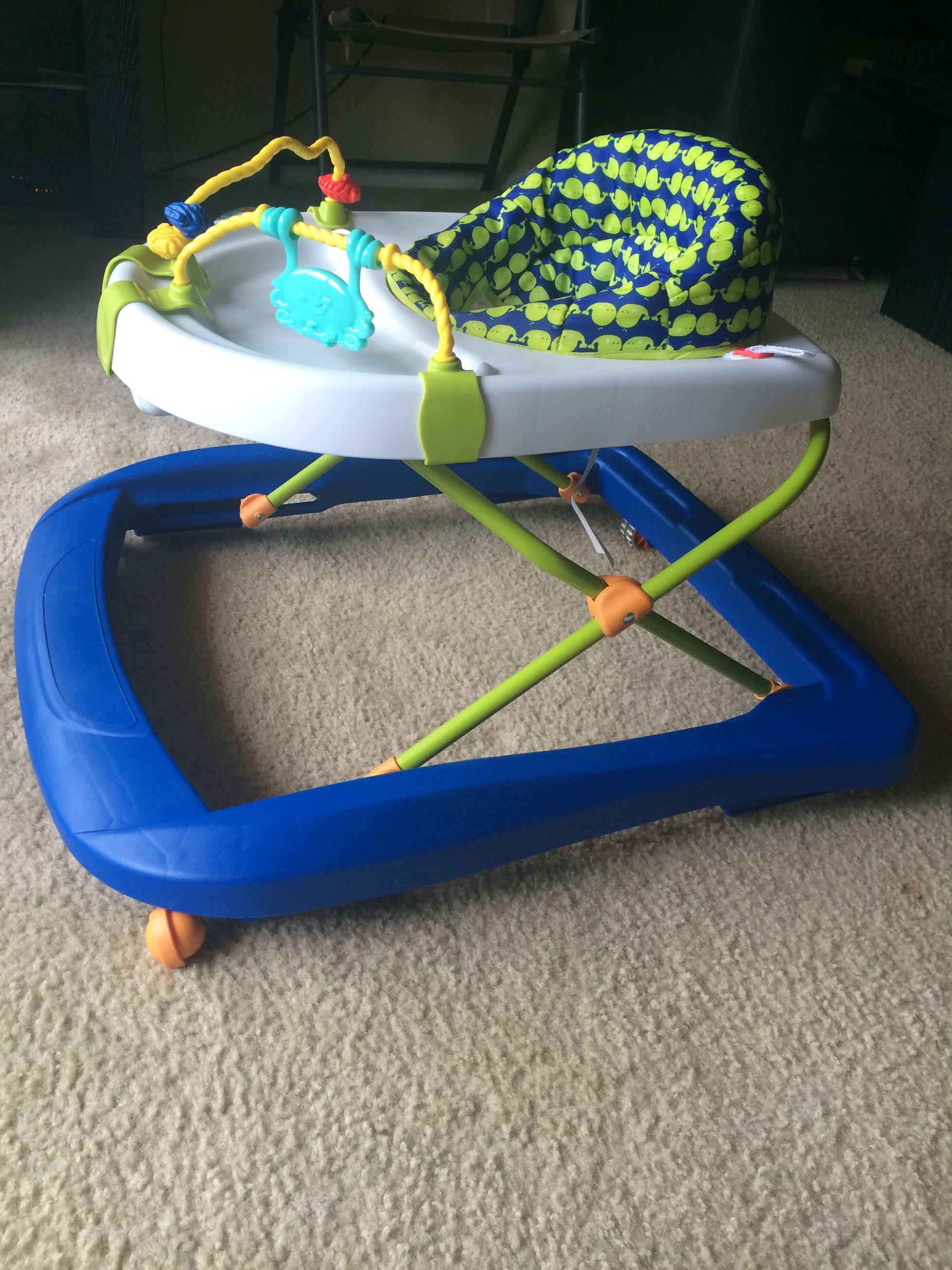 Cosco baby walker. Very good condition. Lightly used. Remove the toy